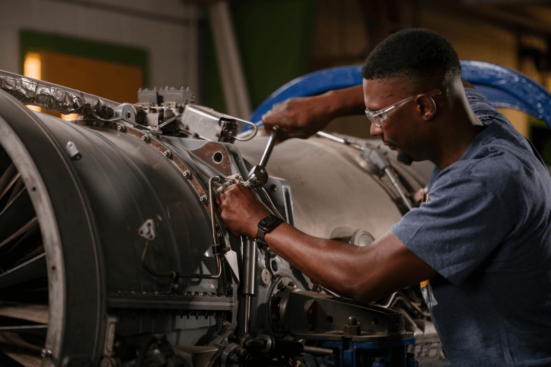 Technician working on an aircraft