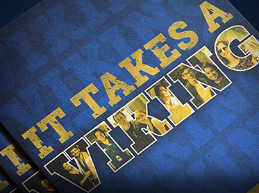Photo of stack of Del Mar College "It Takes a Viking" viewbooks
