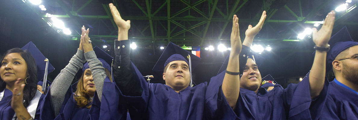 Fall 2018 graduates doing the Viking Clap at commencement