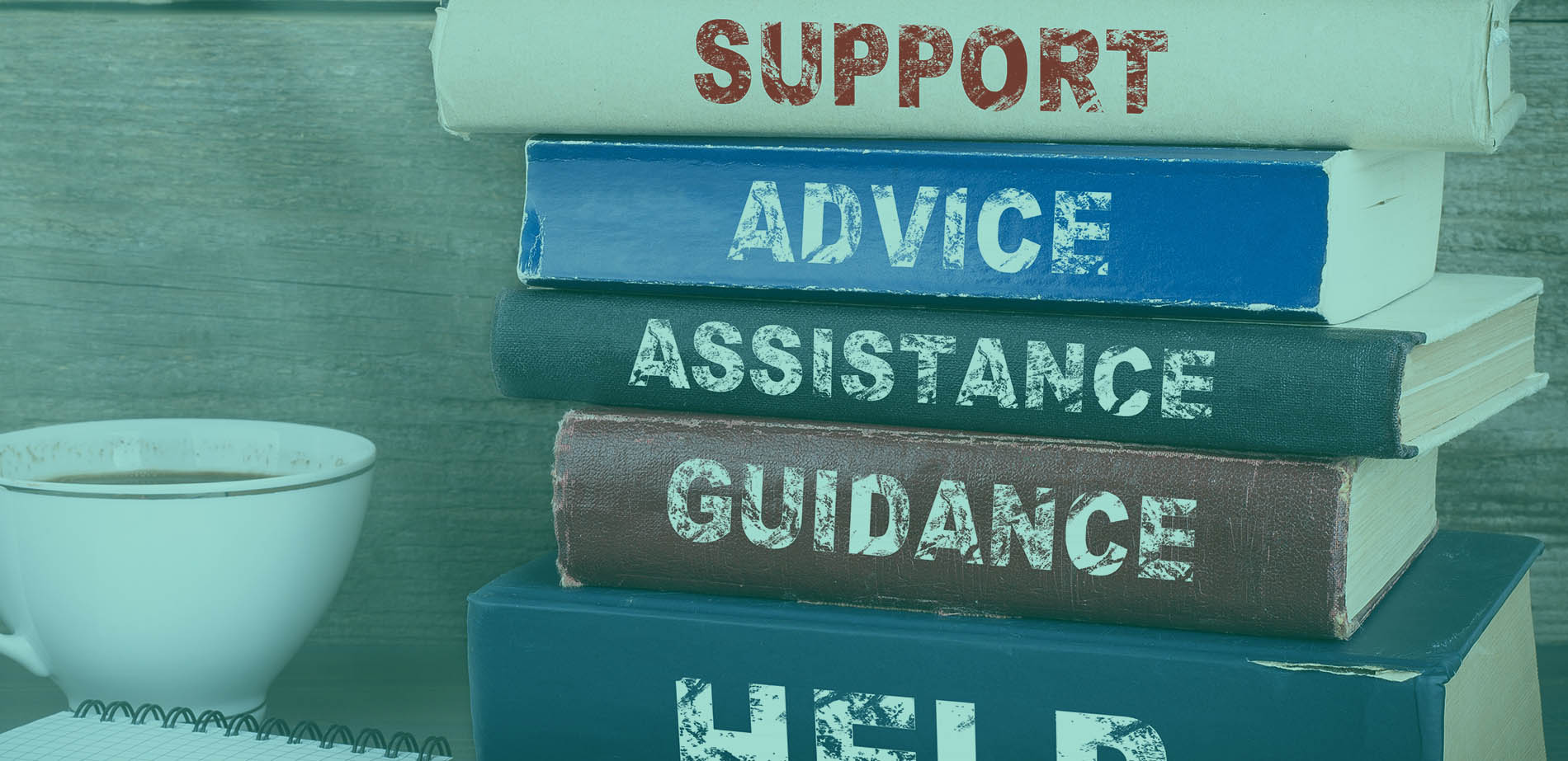 A stack of books with titles reading Support Advice Assistance Guidance Help