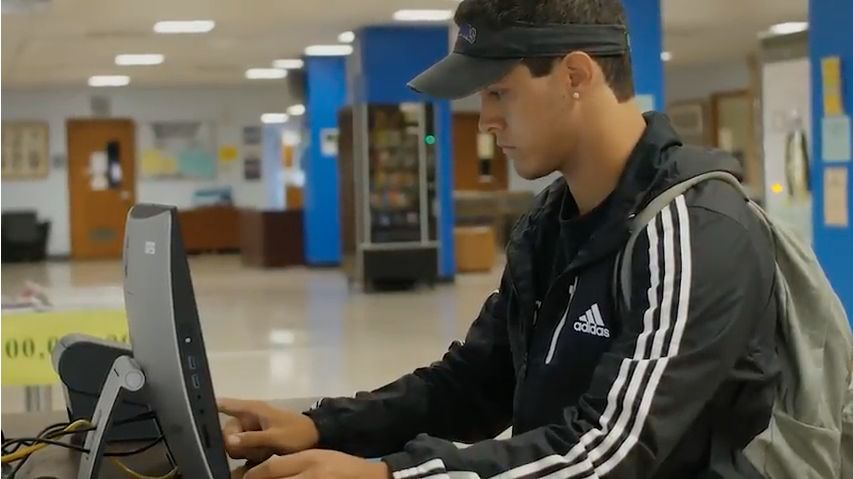 A student joins Viking Virtual Line at a kiosk