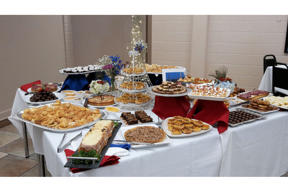 A table filled with culinary and baked goods