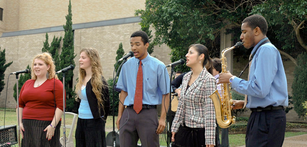 Music students perform outside