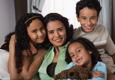 student mom with 3 kids, happy and smiling