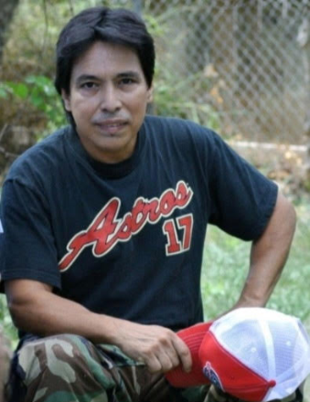 Photo of Tony Alcazar posing outside