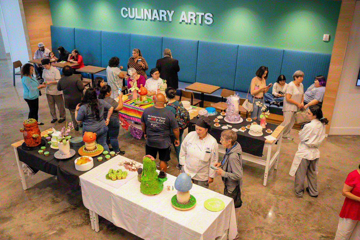 A group of students and patrons at the Culinary building at a presentation