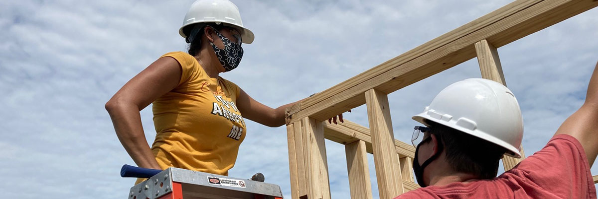 Rebuild Texas students working on a carpentry project