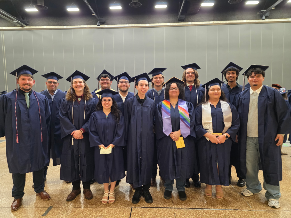 A group of graduates standing together.