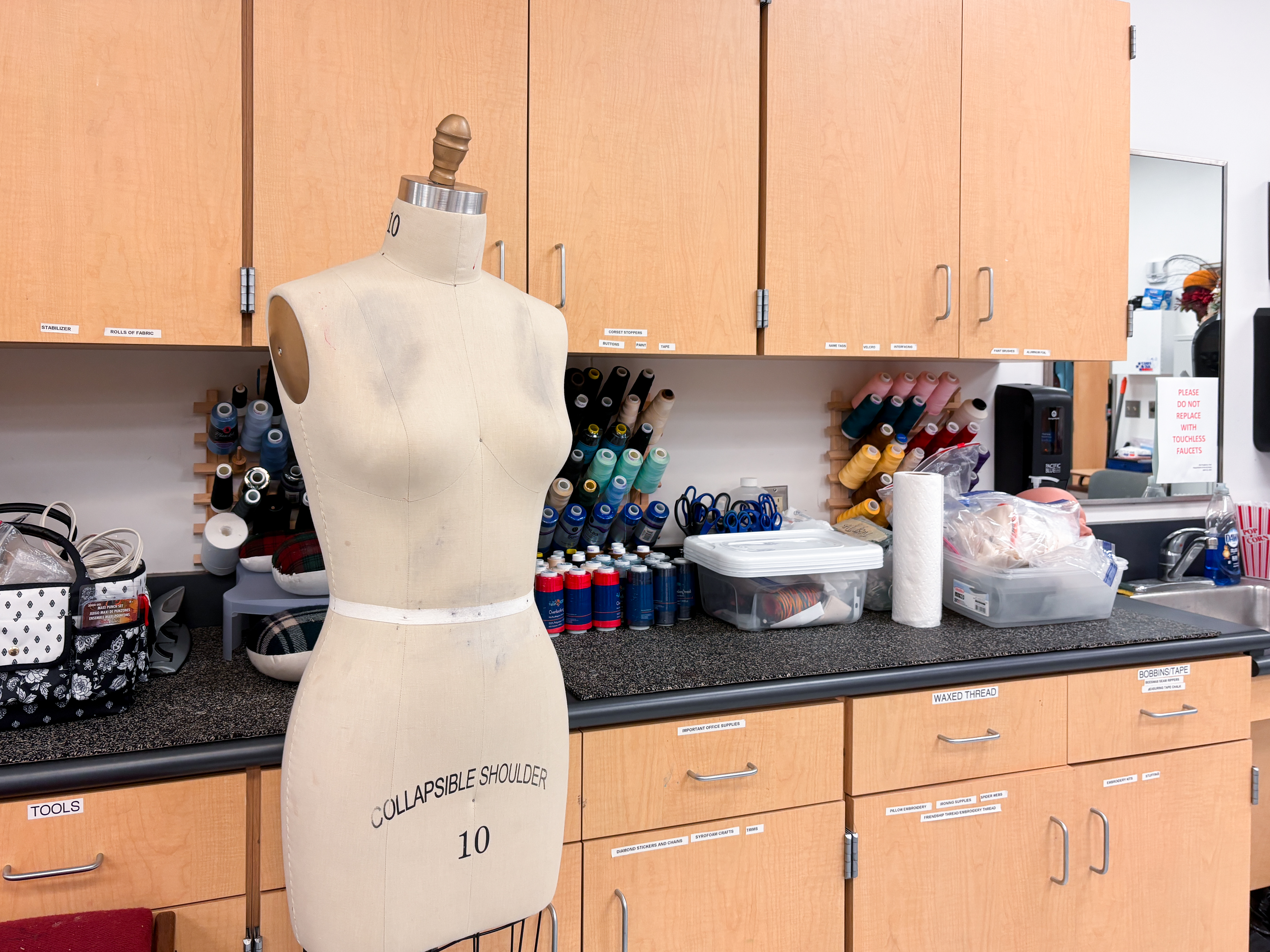 sewing room with mannaquin