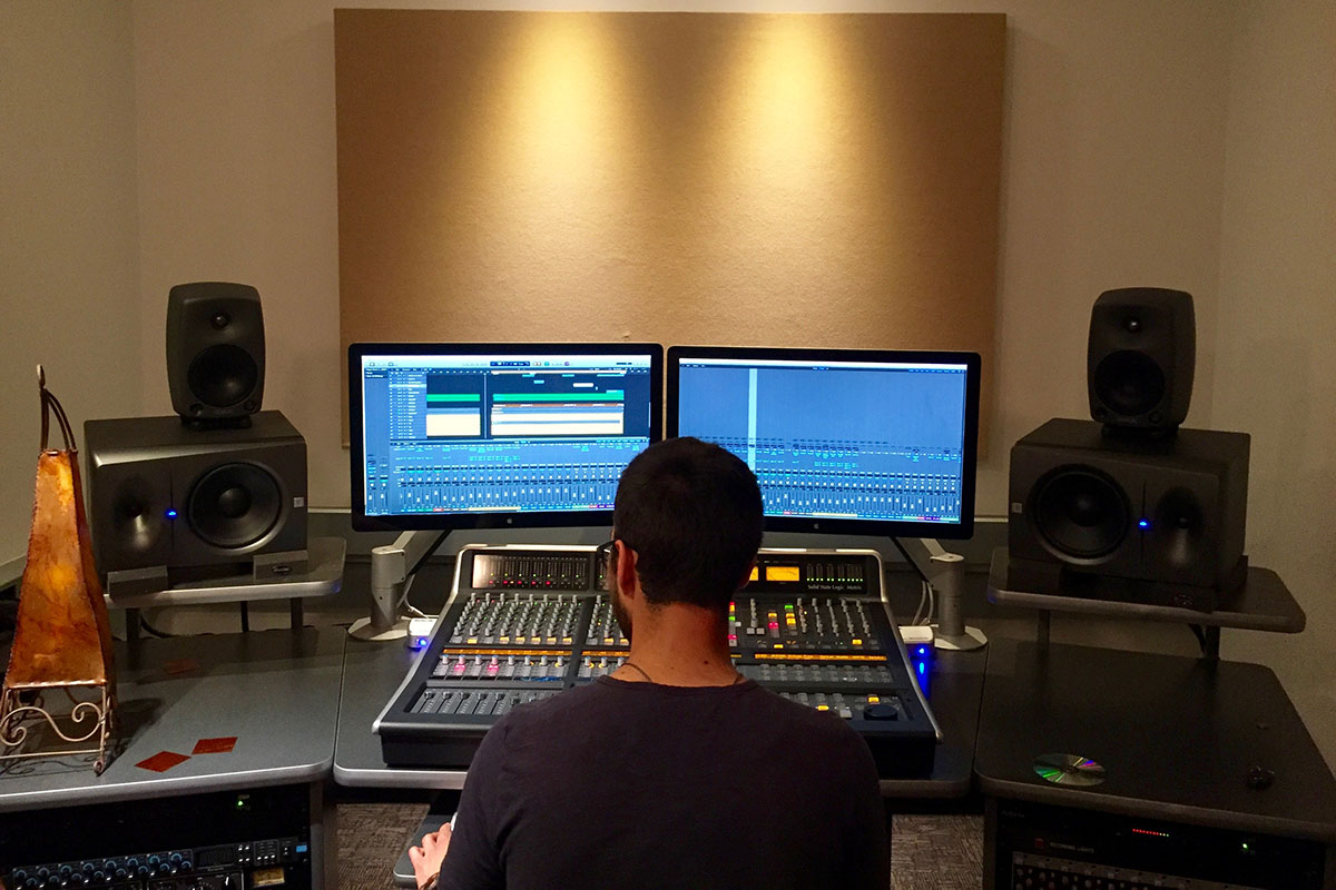 Student sitting at console with back to camera