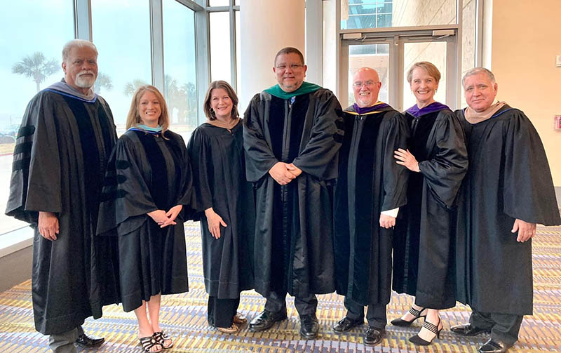 Regents with Dr. Osbert Blow, Spring 2022 commencement speaker