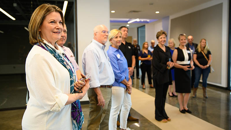 Del Mar College (DMC) Board of Regents Chairwoman Carol A. Scott (left), District 3 Regent Bill Kelly and Board Secretary and At-large Regent Libby Averyt listen to architects and contractors as they take a tour of the Oso Creek Campus on May 10, 2022. 